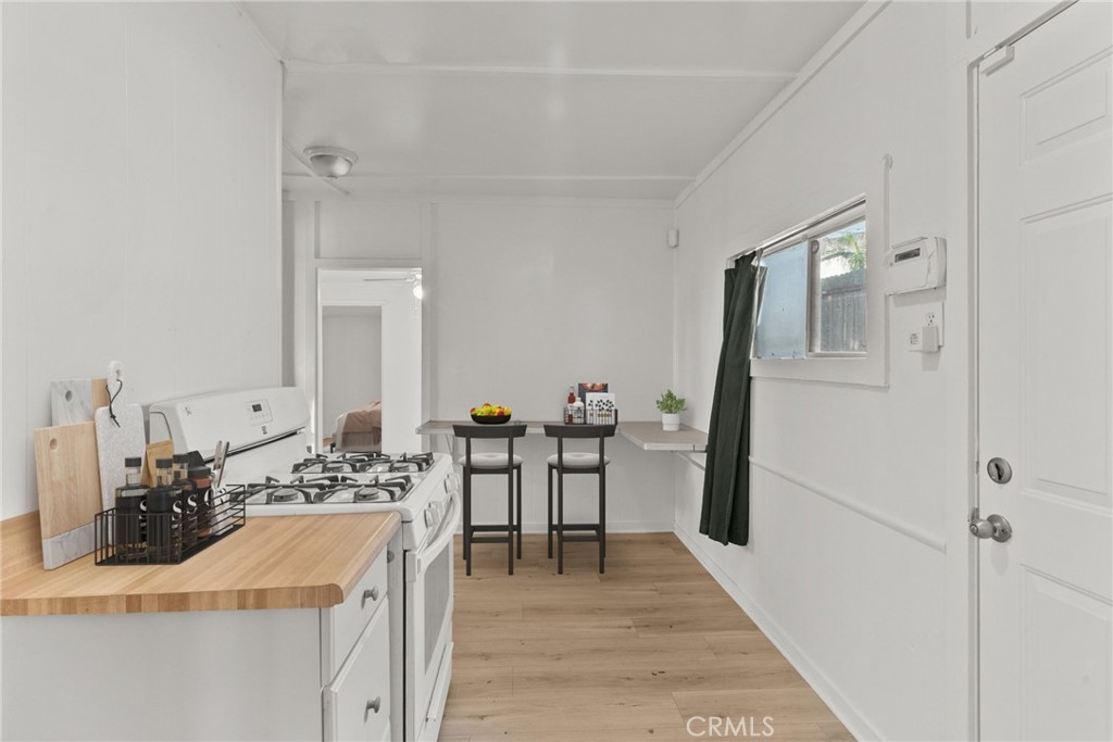 7053 Sunnycrest Trail Tujunga, CA 91042 - Photo 8 of 19 a kitchen with a sink stove and refrigerator