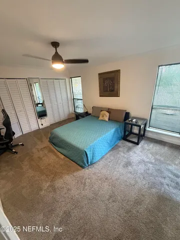 a bathroom with a sink a toilet and vanity