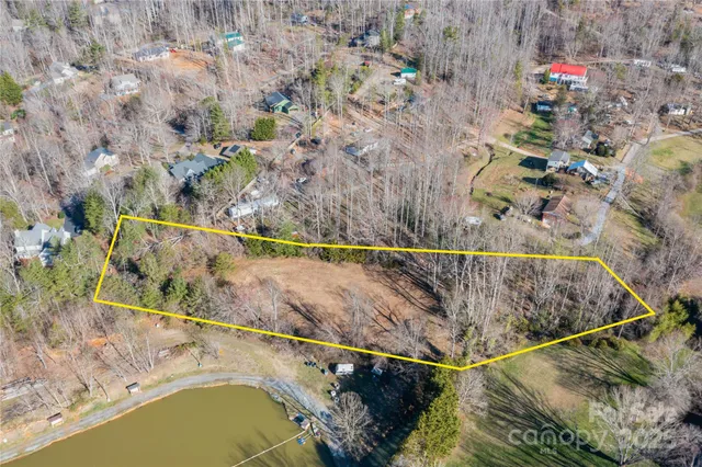 a view of swimming pool with a yard