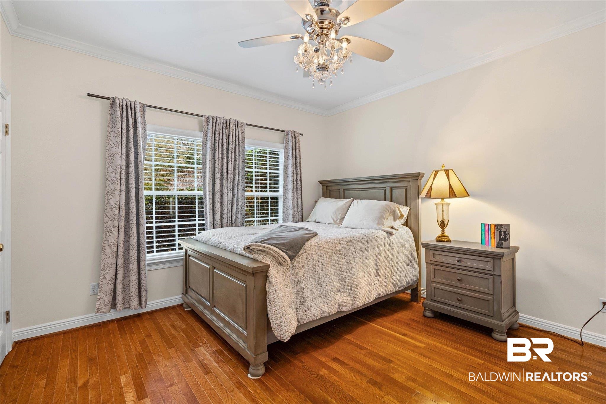 4851 Audubon Drive Mobile, AL 36619 - Photo 17 of 46 Bedroom featuring wood-type flooring, ceiling fan, and crown molding