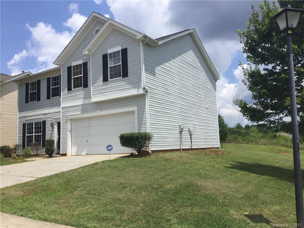 6304 Trotters Ridge Road Charlotte, NC 28227 - Photo 2 of 9 a view of an house with backyard and a tree