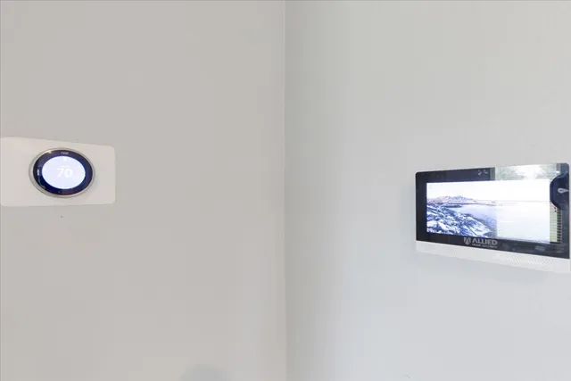 a view of a wall with a painting on the wall