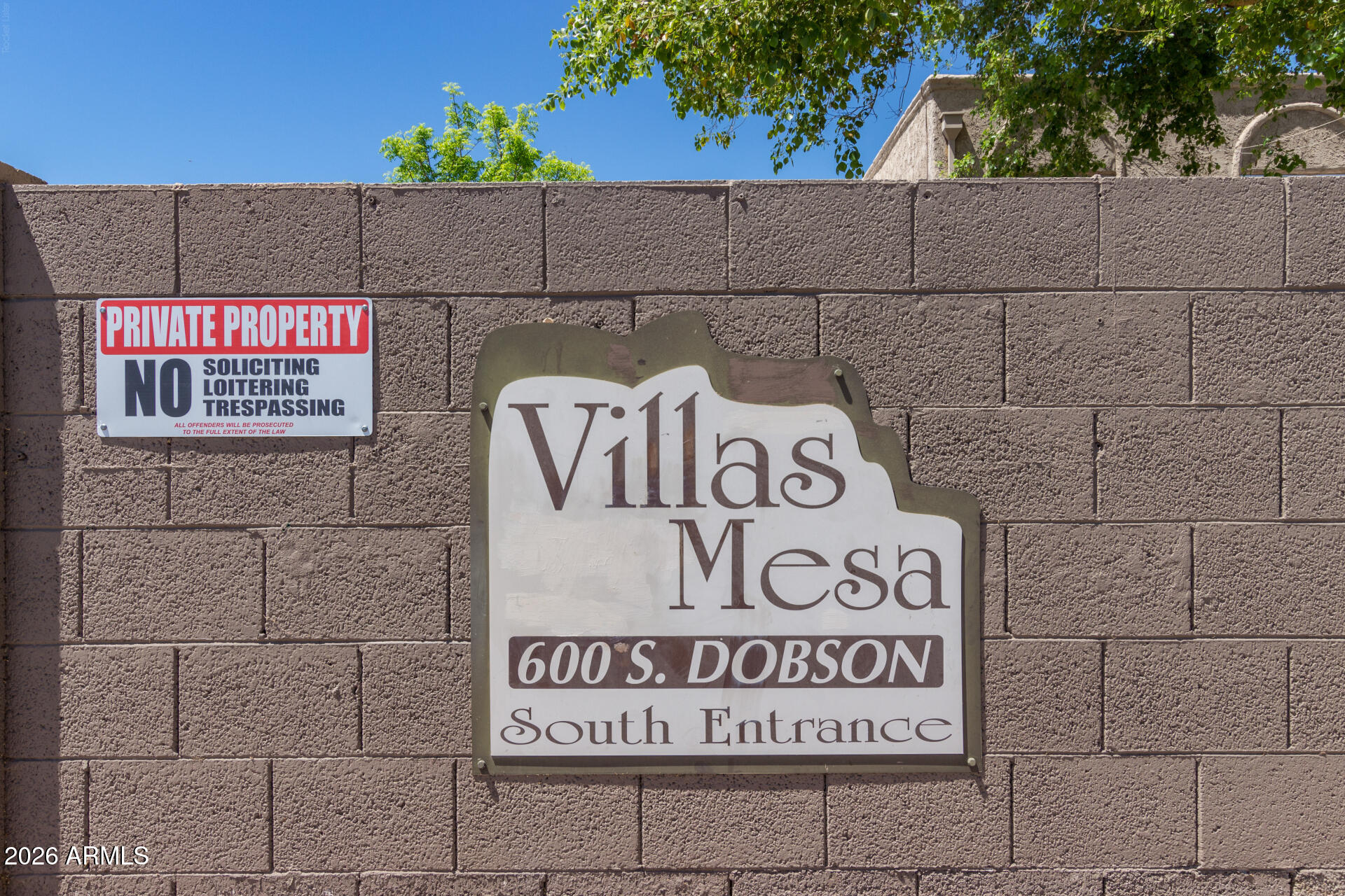 600 South Dobson Road, Unit 177 Mesa, AZ 85202 - Photo 24 of 24 a view of outdoor space with signage and flags