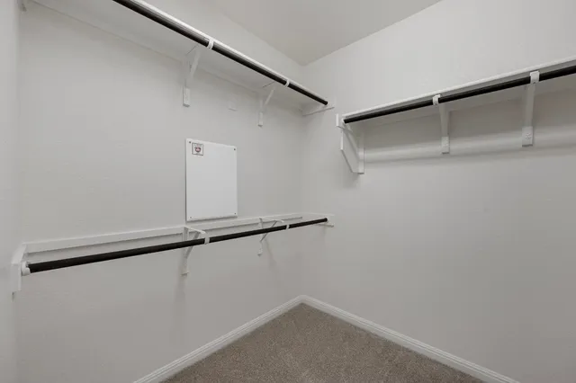 a bathroom with a sink double vanity and shower