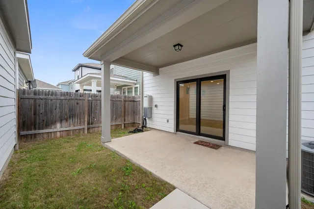 a view of storage and utility room with washer and dryer