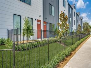 a view of a garden from a balcony
