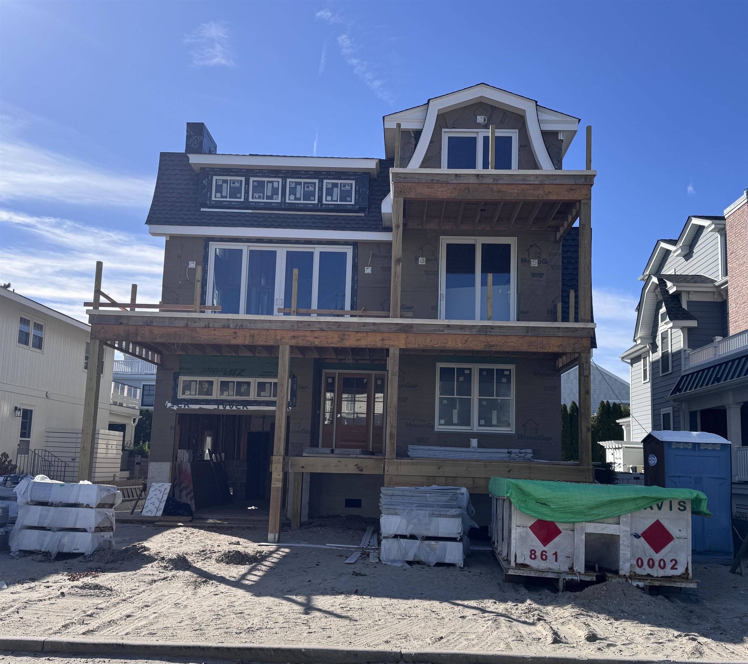 a front view of a building with many windows