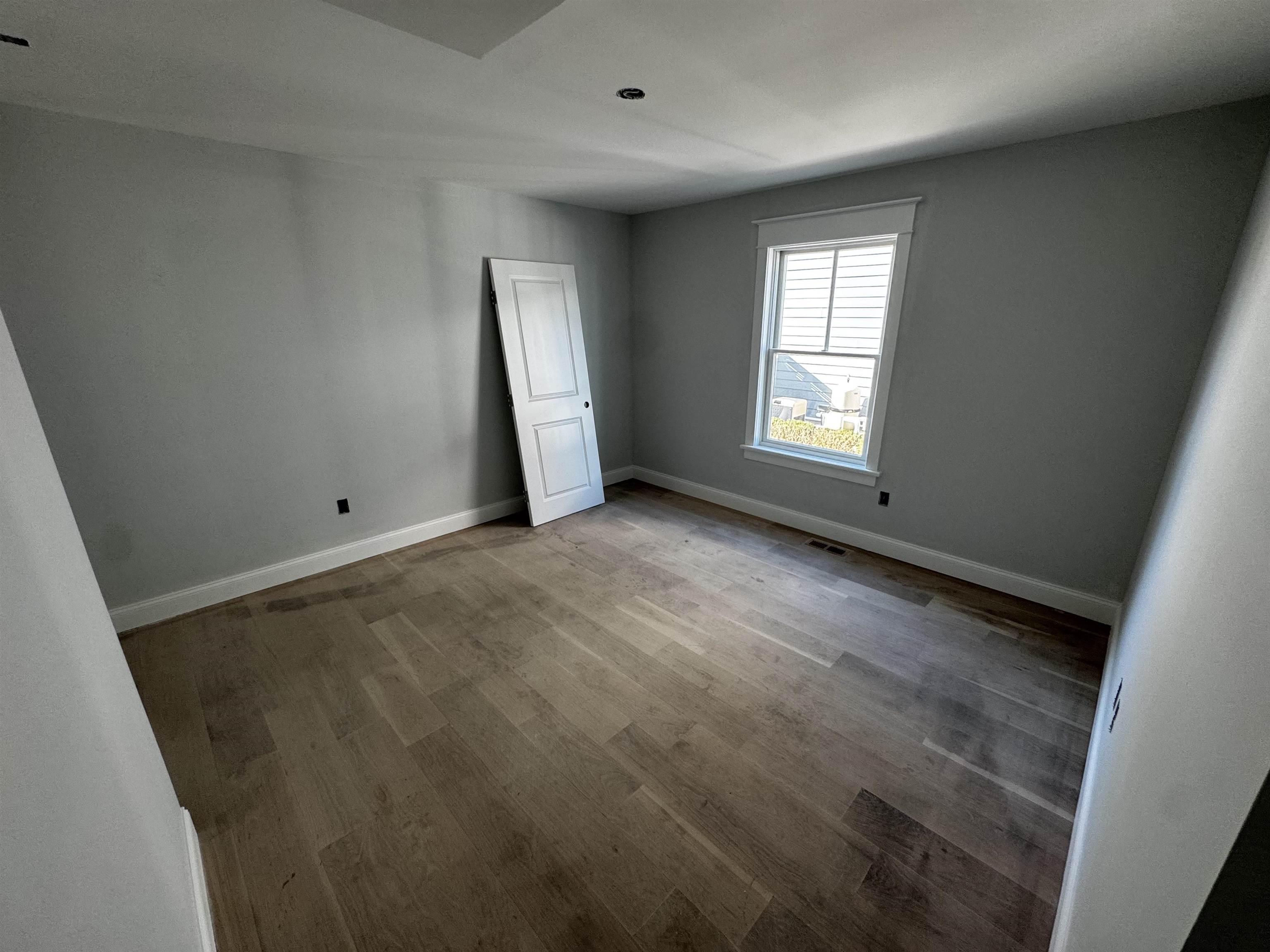 34 West 13th Street Avalon, NJ 08202 - Photo 16 of 28 an empty room with windows