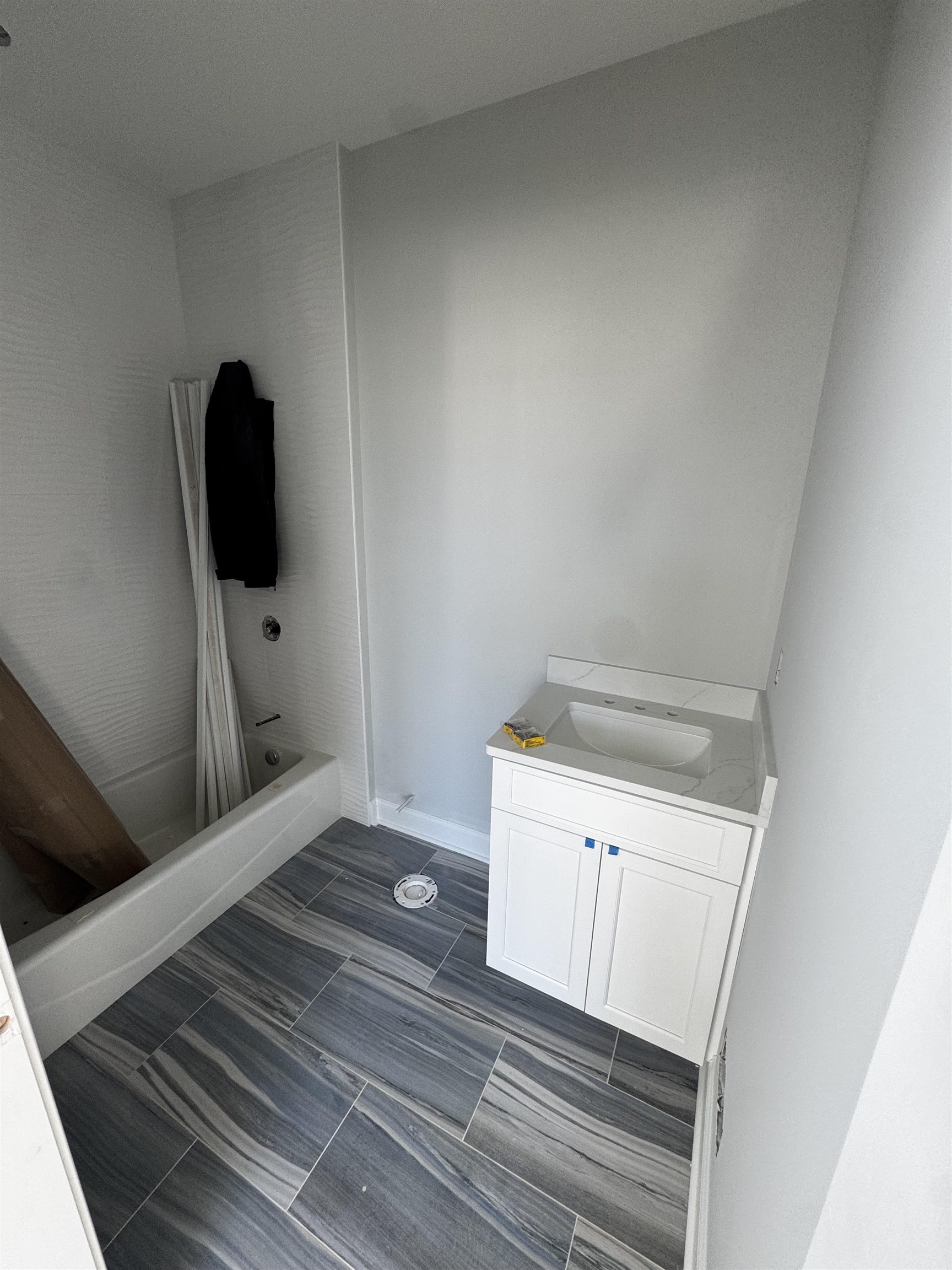 34 West 13th Street Avalon, NJ 08202 - Photo 23 of 28 a view of a hardwood floor and utility room