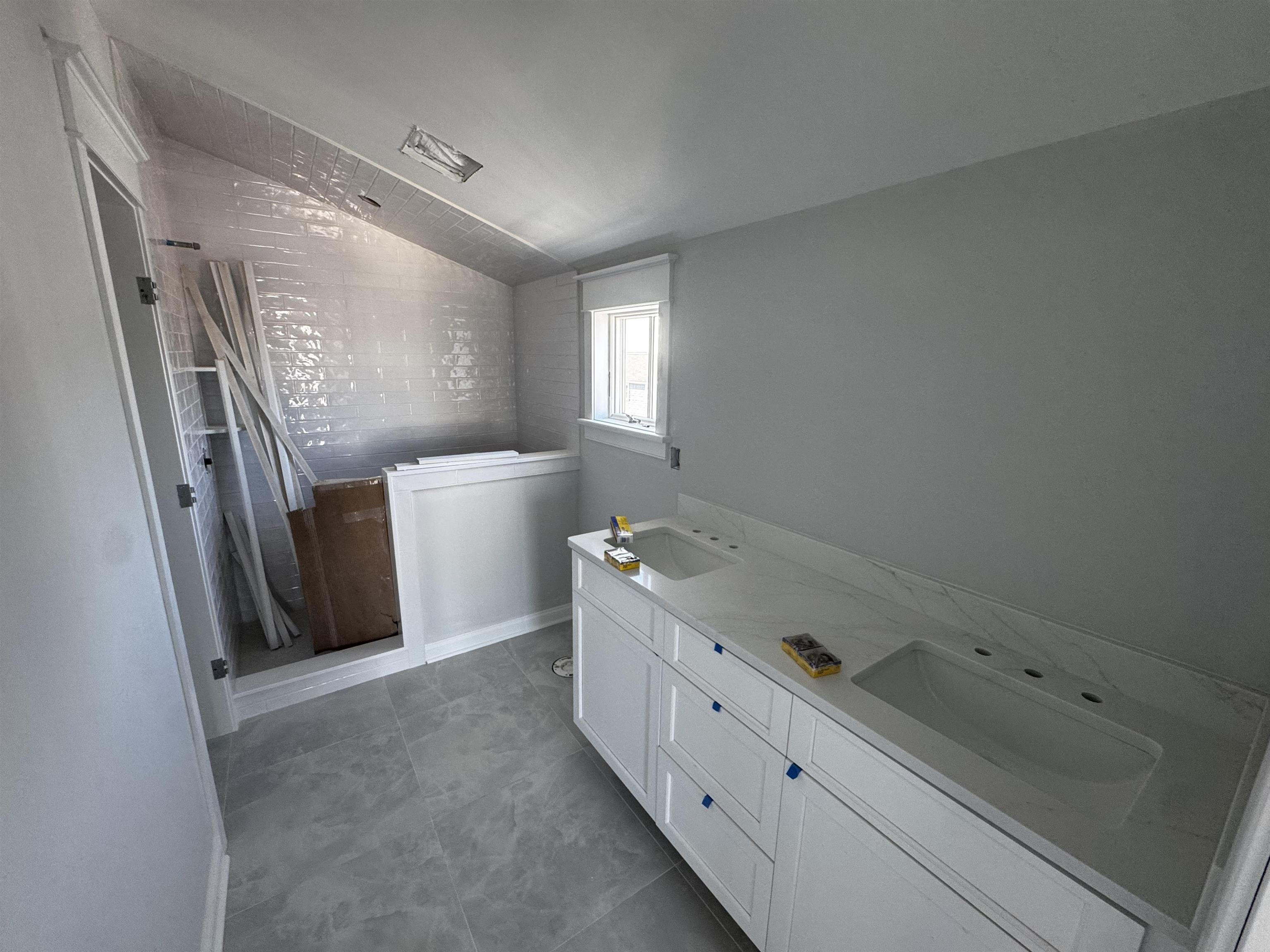 34 West 13th Street Avalon, NJ 08202 - Photo 25 of 28 a room with a baby crib and a dresser