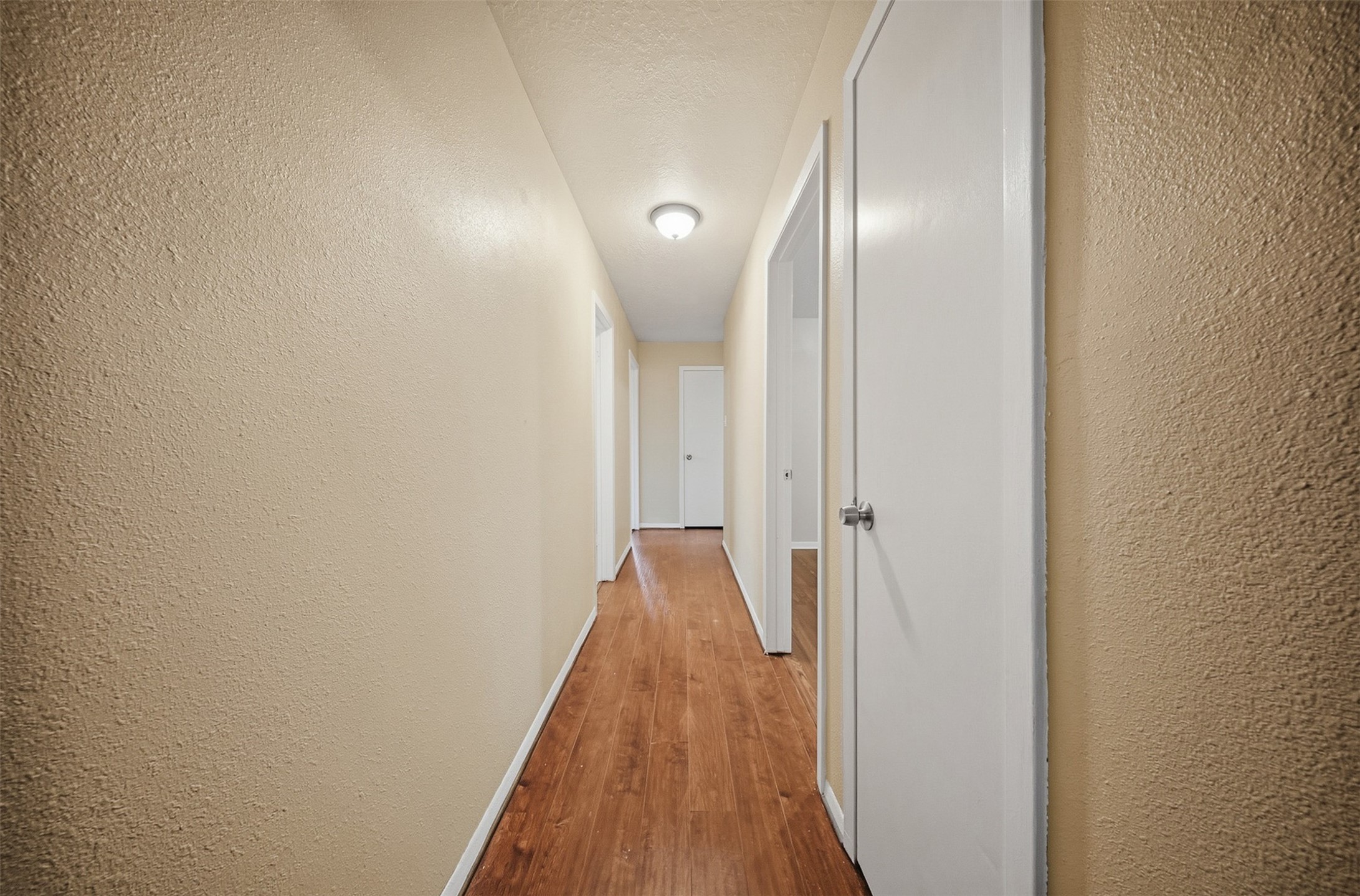 401 Turner Cemetery Road Livingston, TX 77351 - Photo 11 of 34 a view of a hallway with wooden floor