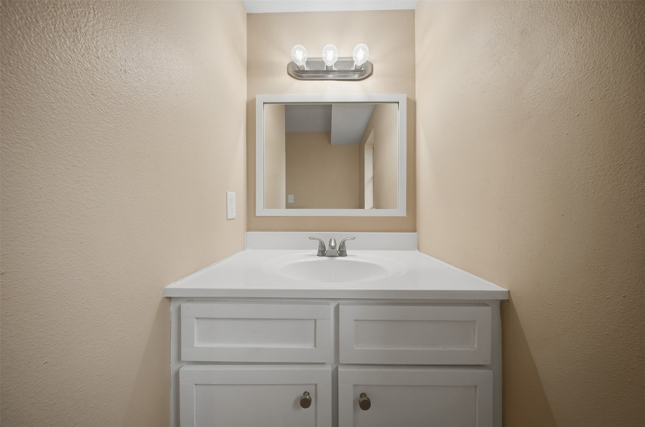 401 Turner Cemetery Road Livingston, TX 77351 - Photo 15 of 34 a bathroom with a sink and a mirror