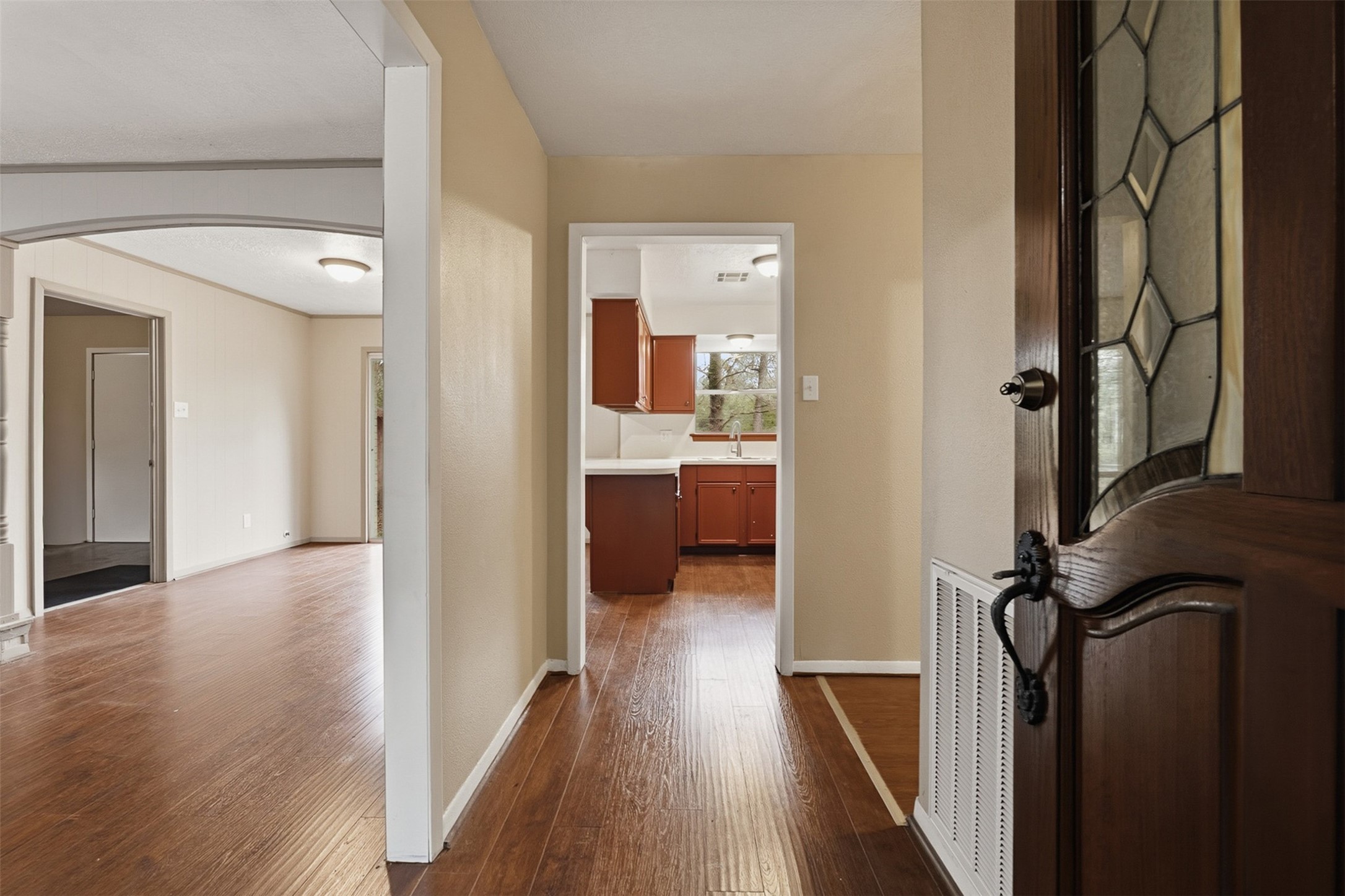 401 Turner Cemetery Road Livingston, TX 77351 - Photo 4 of 34 a view of a hallway with wooden floor windows and a livingroom
