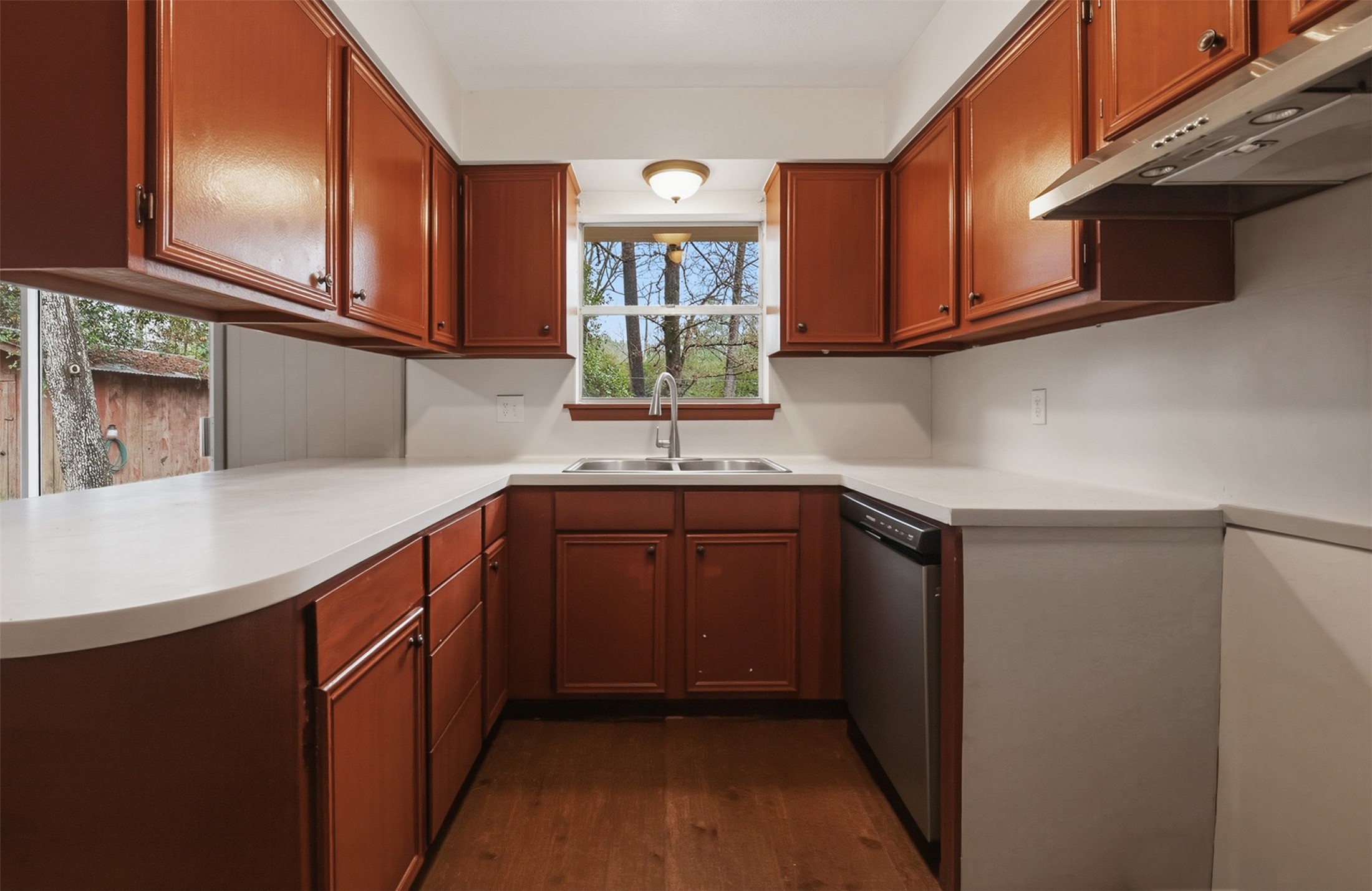 401 Turner Cemetery Road Livingston, TX 77351 - Photo 6 of 34 a kitchen with stainless steel appliances granite countertop a sink a stove and cabinets