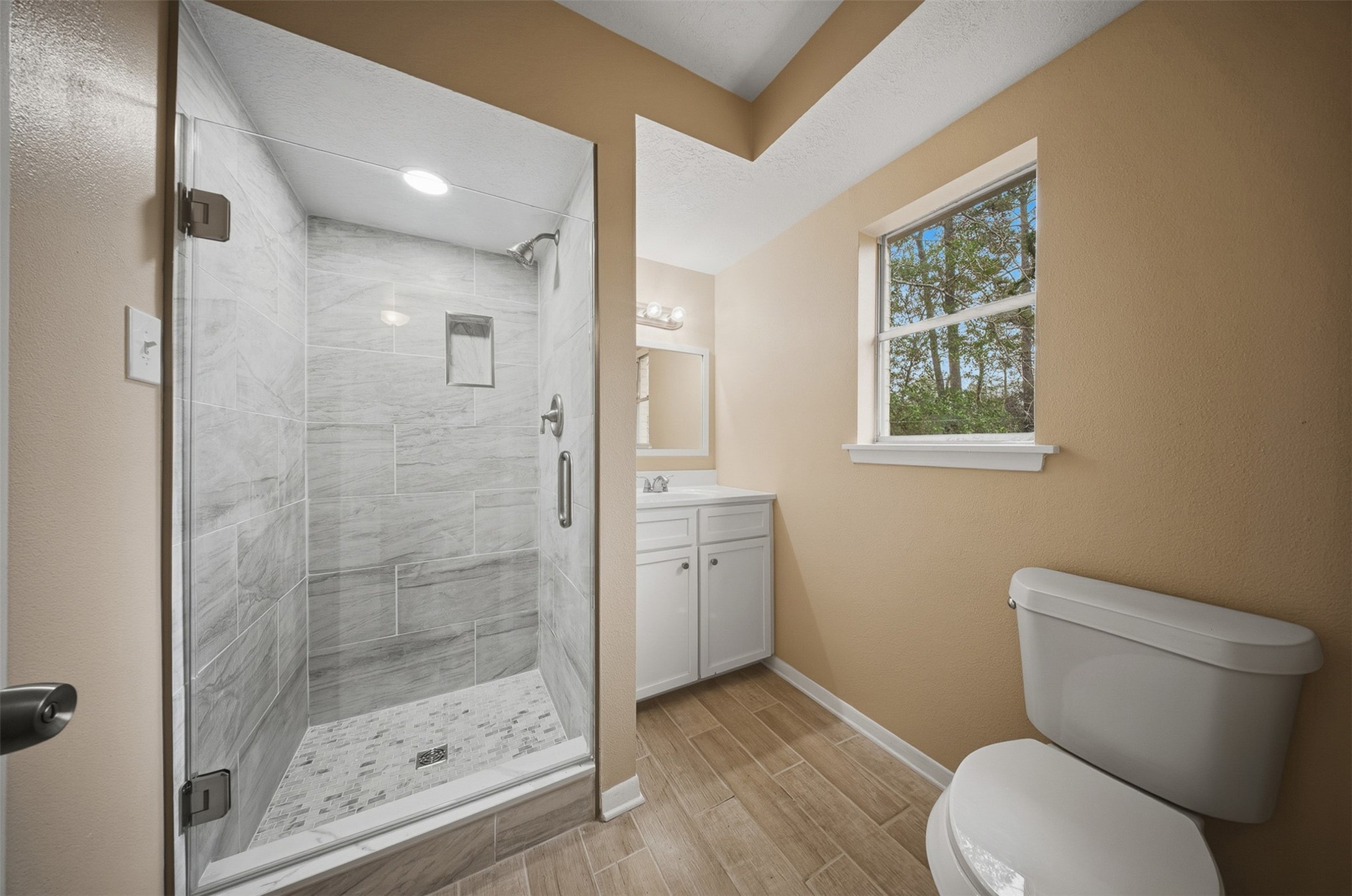 401 Turner Cemetery Road Livingston, TX 77351 - Photo 10 of 34 a bathroom with a toilet and a shower