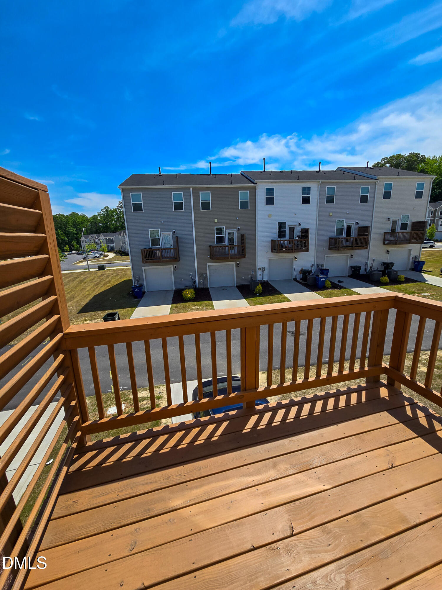 2431 Kasota Lane Raleigh, NC 27610 - Photo 46 of 46 a view of a balcony with wooden floor