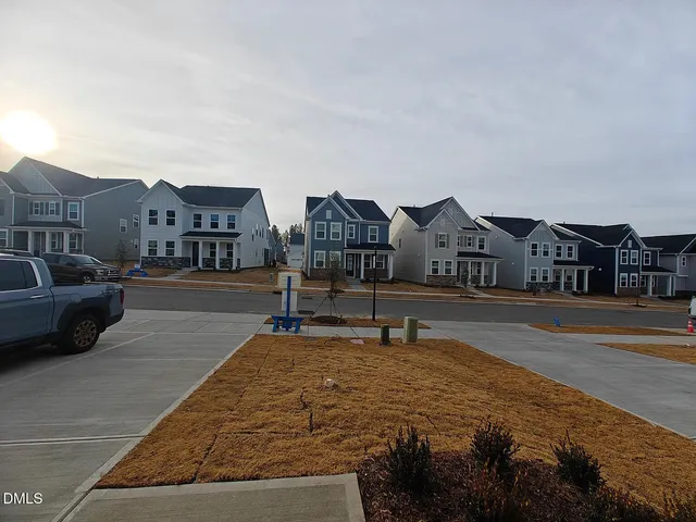 a park view covered with tall buildings