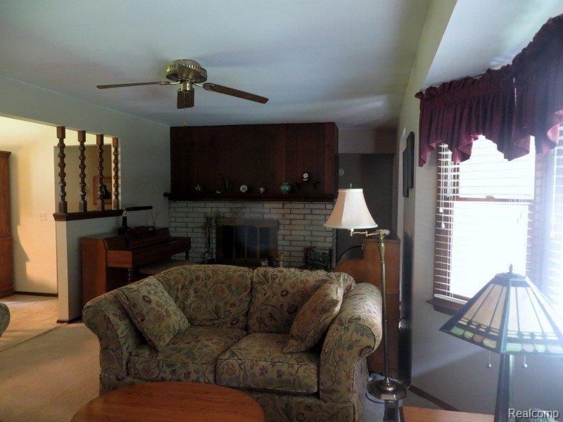 12290 Dunham Road Hartland, MI 48353 - Photo 4 of 15 fireplace in living room.JPG