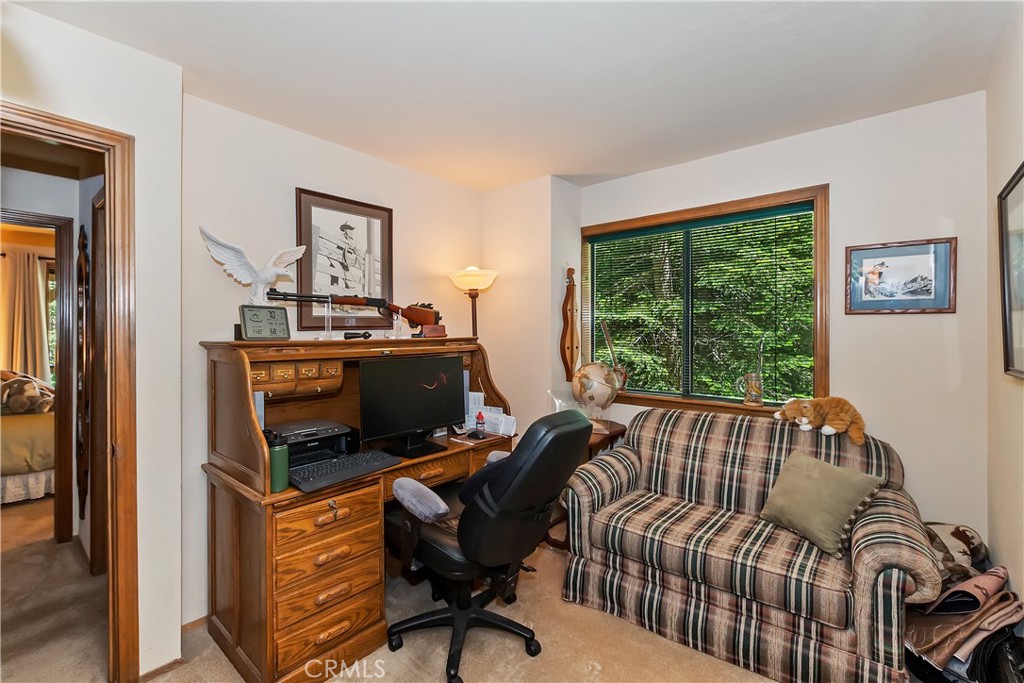 1100 Arbula Drive Crestline, CA 92325 - Photo 25 of 50 a bedroom with furniture and a window