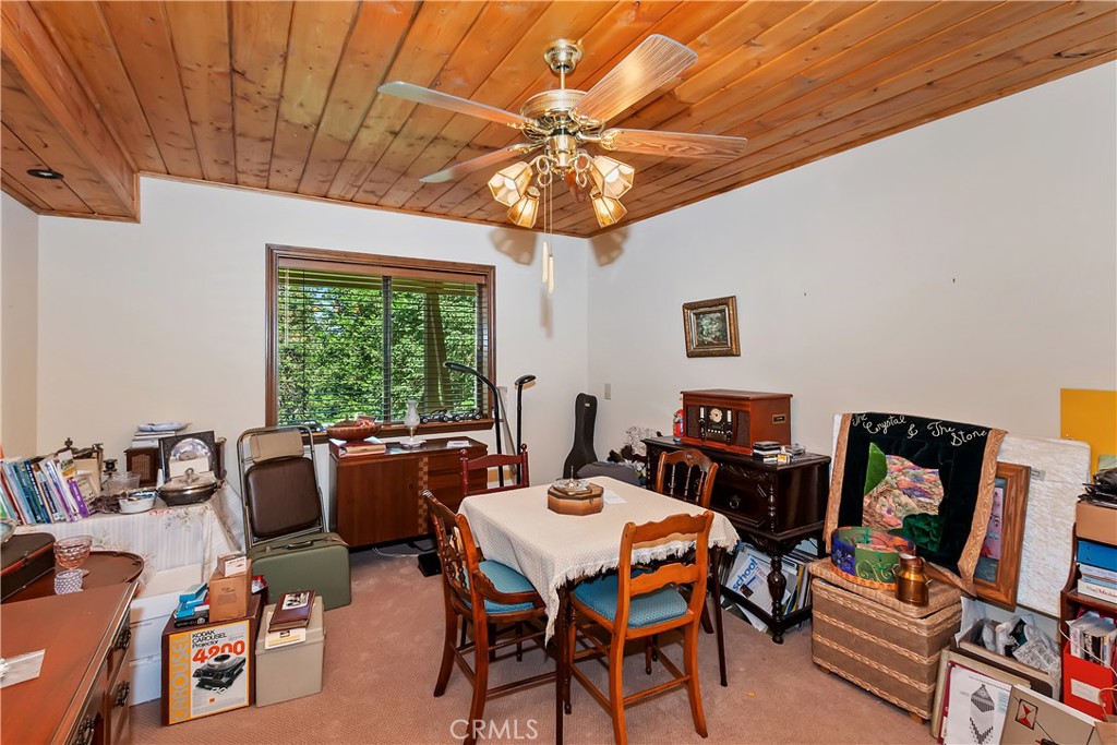 1100 Arbula Drive Crestline, CA 92325 - Photo 28 of 50 a view of a dining room with furniture window and outside view