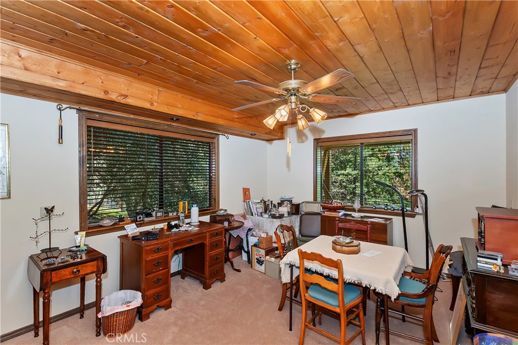 1100 Arbula Drive Crestline, CA 92325 - Photo 29 of 50 a view of a dining room with furniture window and outside view