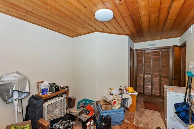 a view of a balcony with wooden floor