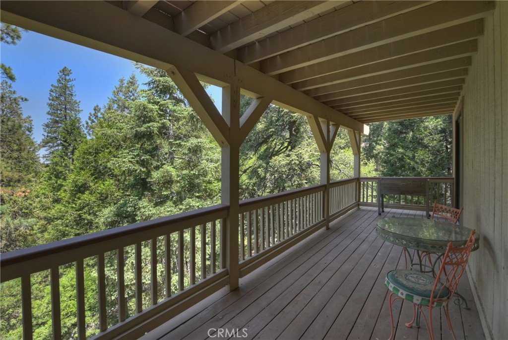 1100 Arbula Drive Crestline, CA 92325 - Photo 35 of 50 a view of balcony with wooden floor