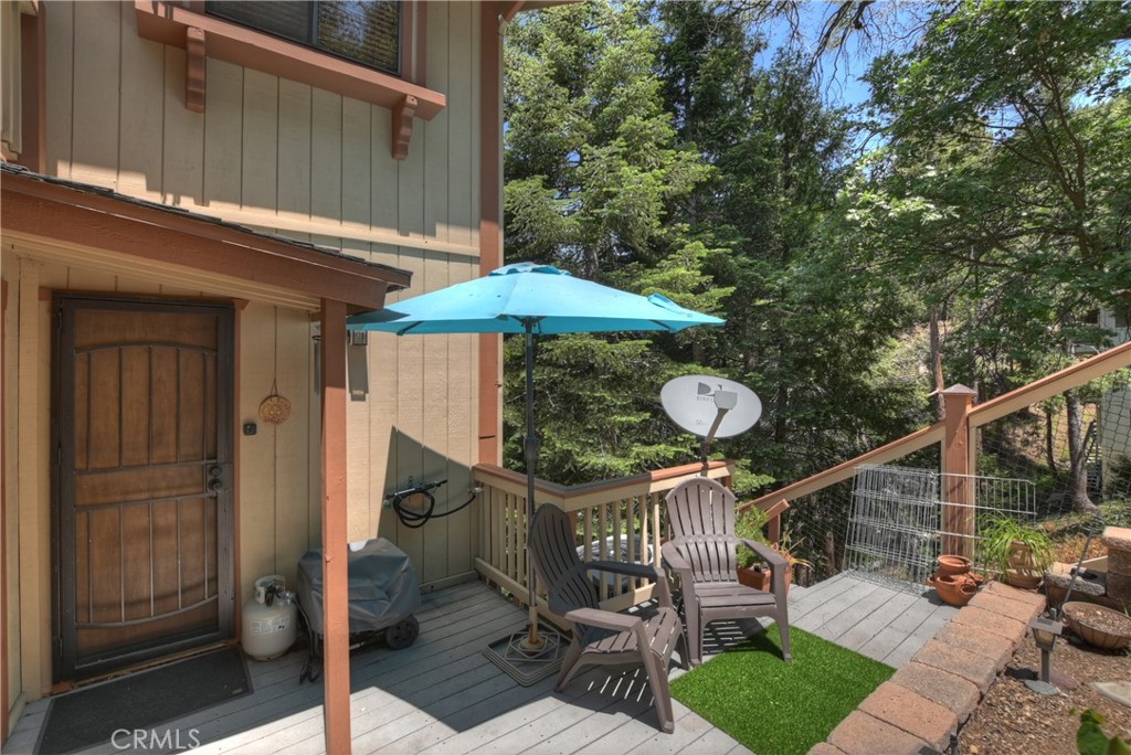 1100 Arbula Drive Crestline, CA 92325 - Photo 38 of 50 a view of a house with backyard and furniture
