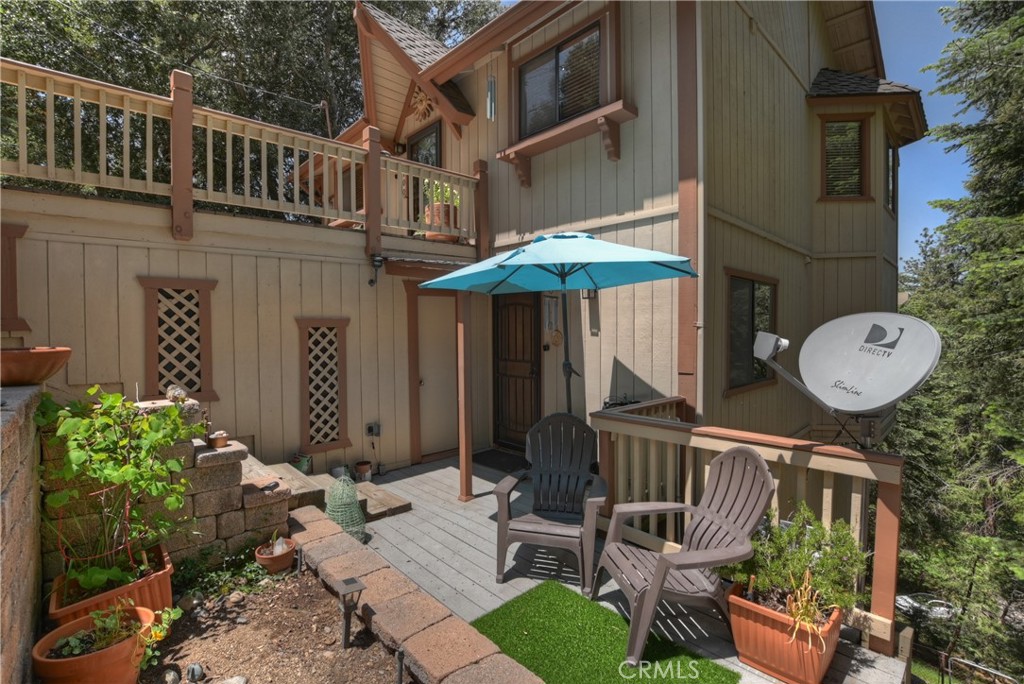 1100 Arbula Drive Crestline, CA 92325 - Photo 39 of 50 a view of a chair and table in backyard