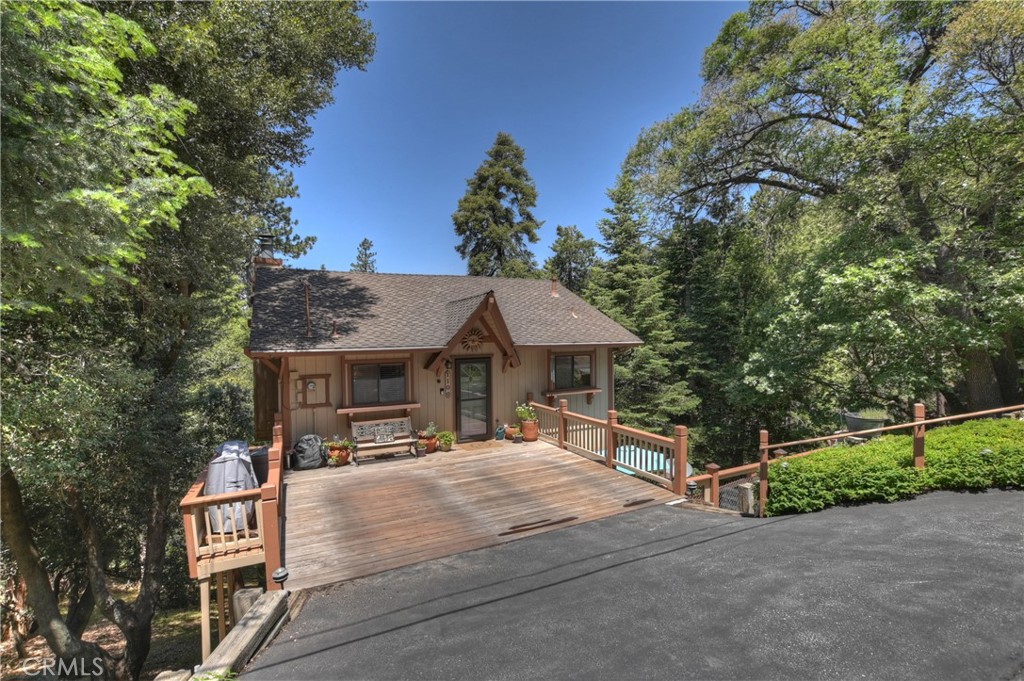 1100 Arbula Drive Crestline, CA 92325 - Photo 42 of 50 a front view of a house with a yard