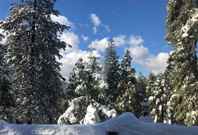 a view of a backyard of a house