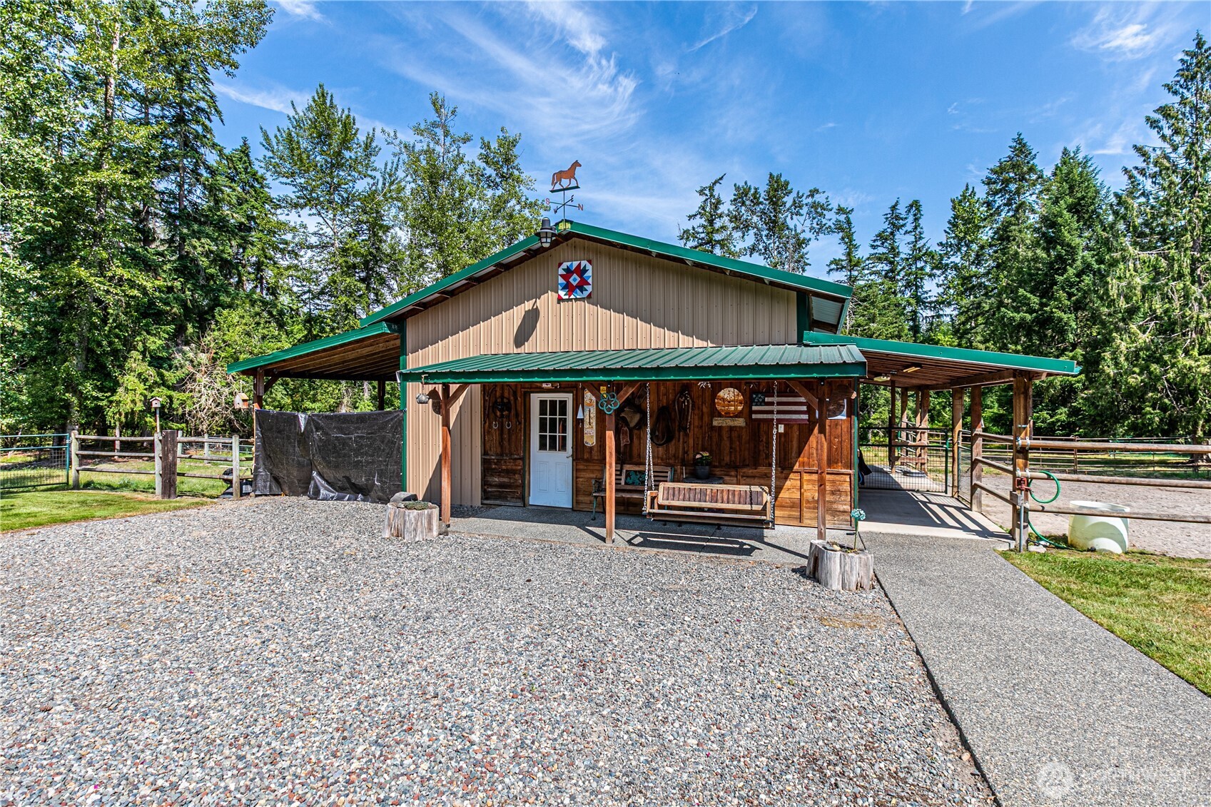 16728 Longmire Road Southeast Yelm, WA 98597 - Photo 11 of 38 a view of sitting area with furniture and wooden deck