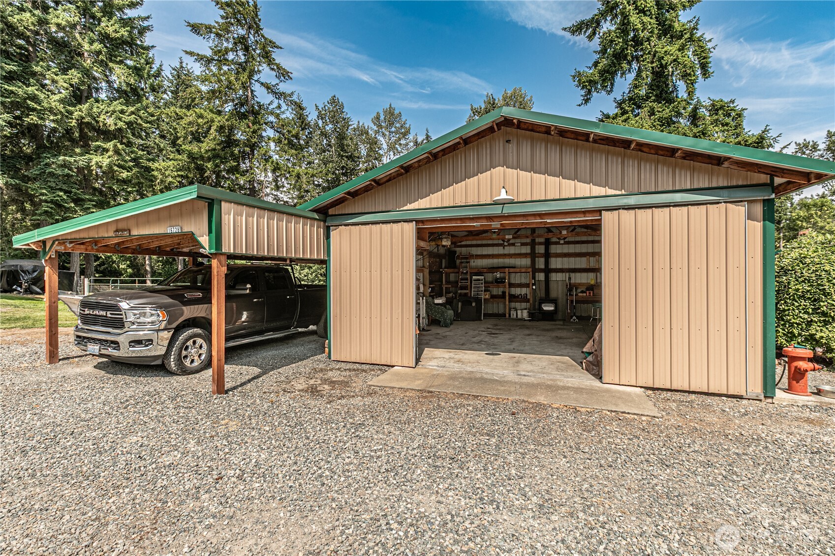 16728 Longmire Road Southeast Yelm, WA 98597 - Photo 15 of 38 a view of an house with garage