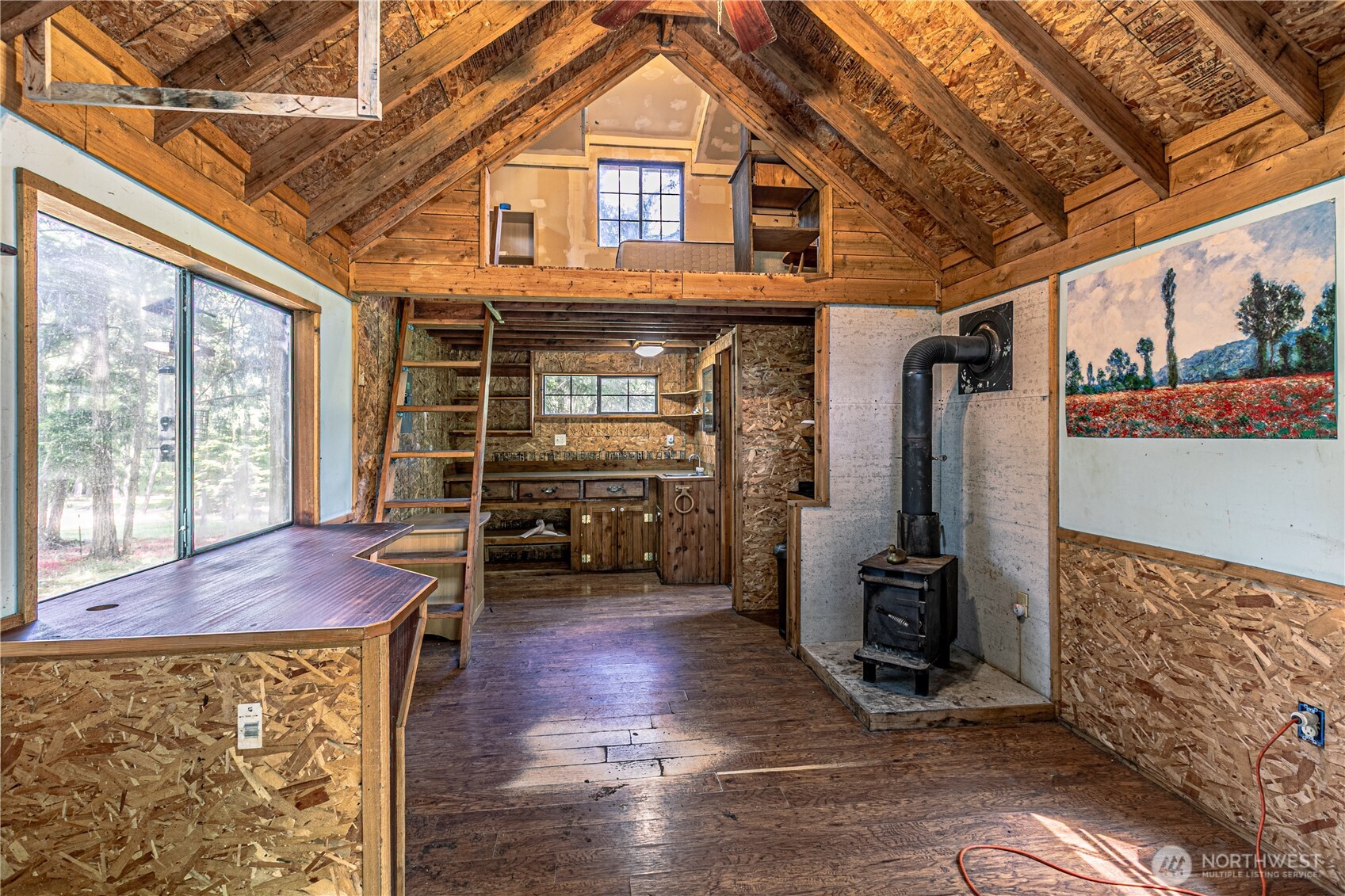 16728 Longmire Road Southeast Yelm, WA 98597 - Photo 18 of 38 a view of livingroom with furniture