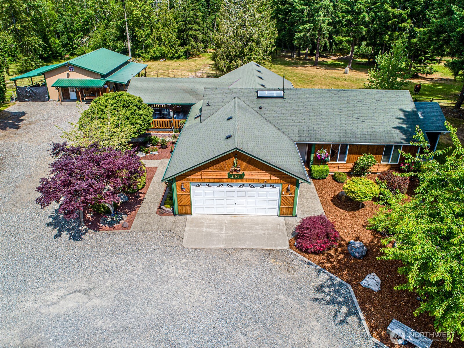 16728 Longmire Road Southeast Yelm, WA 98597 - Photo 2 of 38 an aerial view of a house