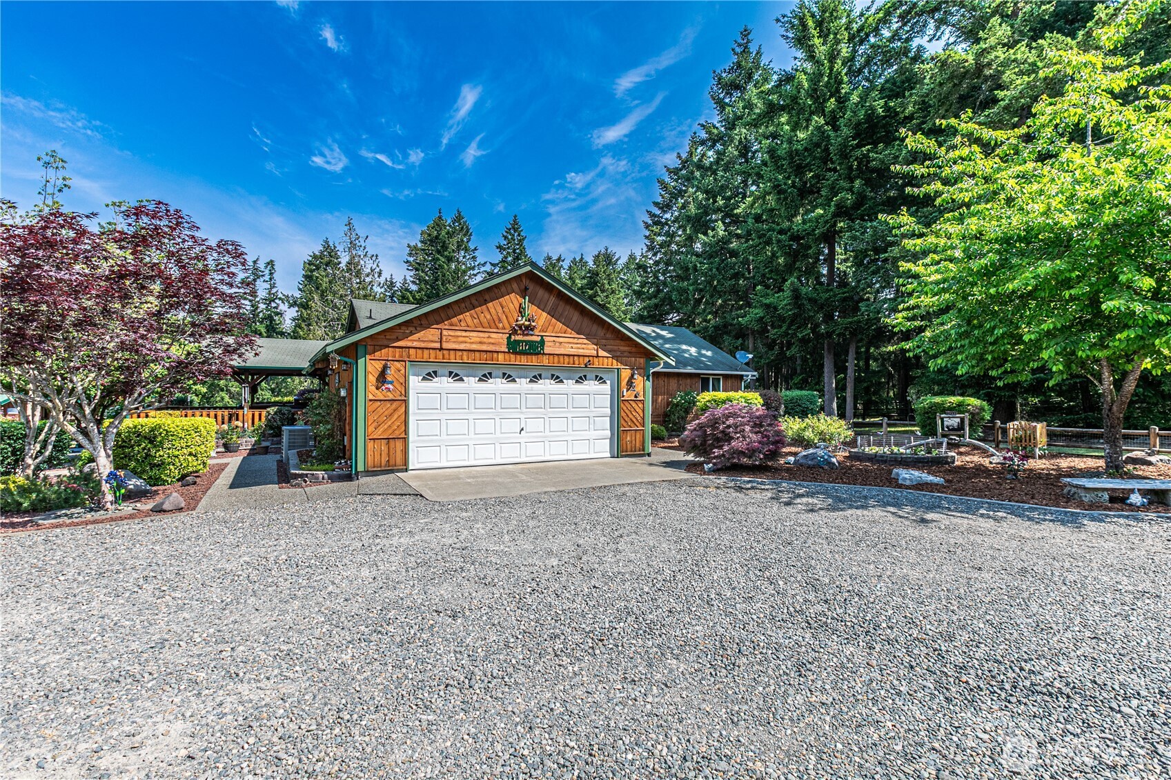 16728 Longmire Road Southeast Yelm, WA 98597 - Photo 3 of 38 a view of a house with a cars park