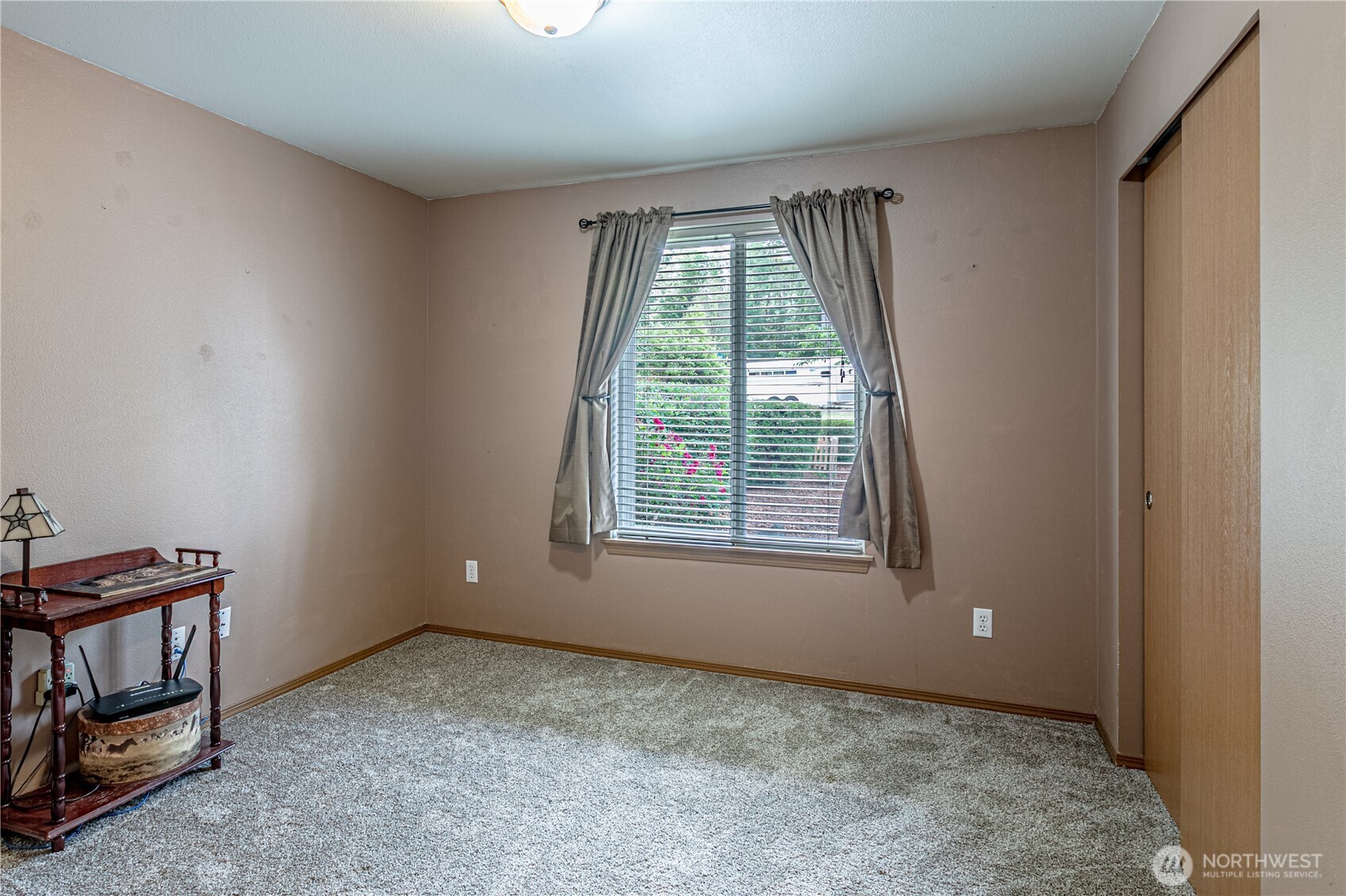 16728 Longmire Road Southeast Yelm, WA 98597 - Photo 32 of 38 an empty room with windows