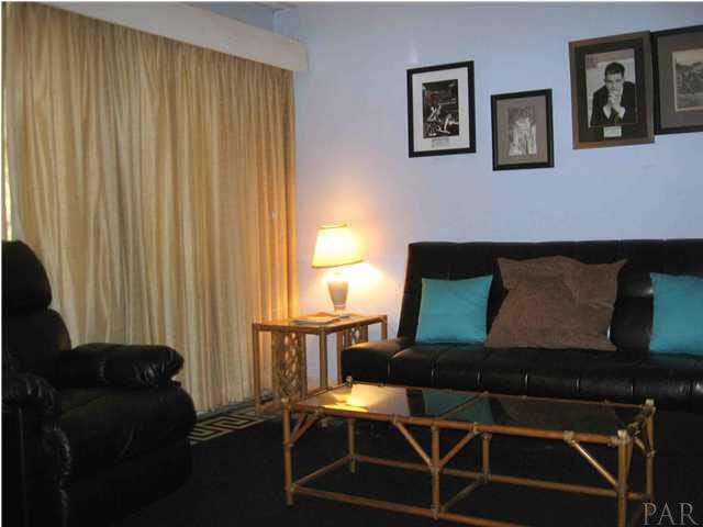 701 Rue Max Street Pensacola, FL 32507 - Photo 2 of 6 Cozy living room with large picture window.