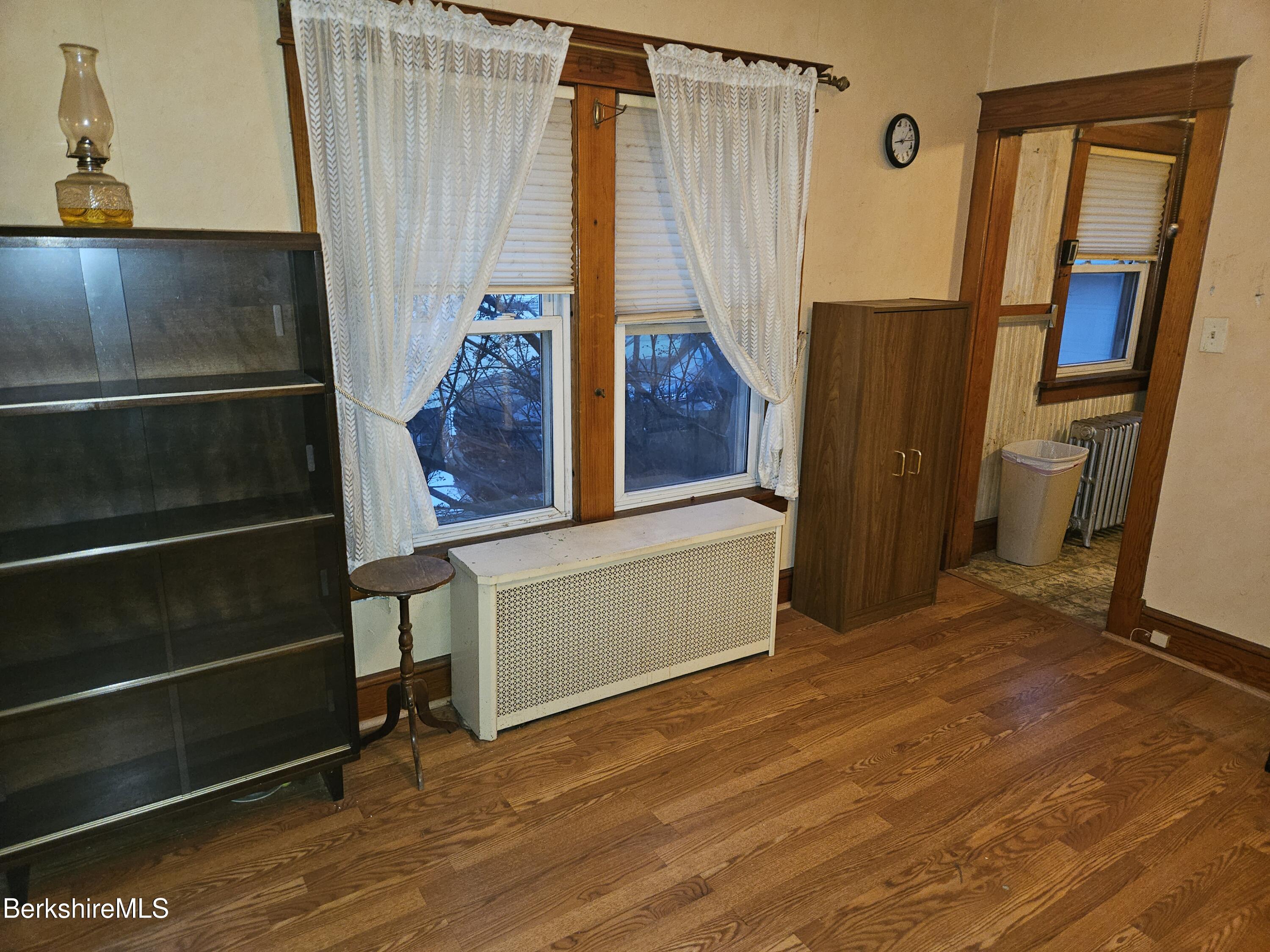 269 2nd Street Pittsfield, MA 01201 - Photo 13 of 39 a view of a room with wooden floor and windows