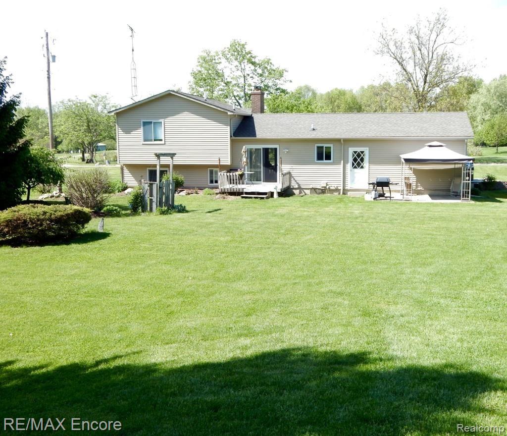 8380 Turner Road Fenton, MI 48430 - Photo 16 of 18 Rear of home -deck and patio