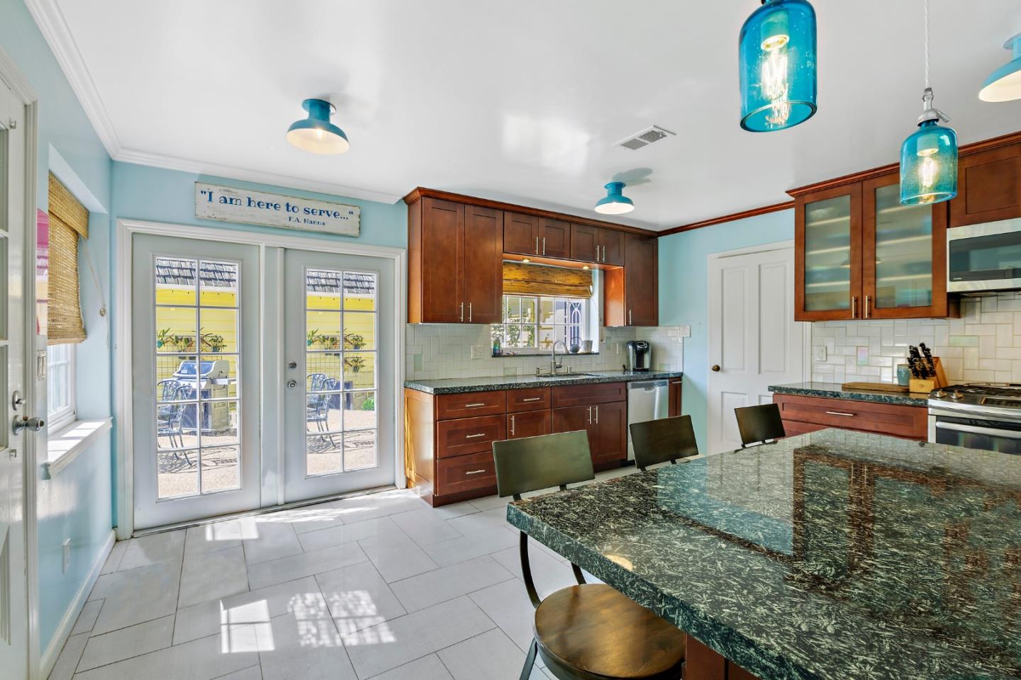 4853 Proctor Road Castro Valley, CA 94546 - Photo 14 of 43 a kitchen with kitchen island granite countertop a sink stove and granite counter top