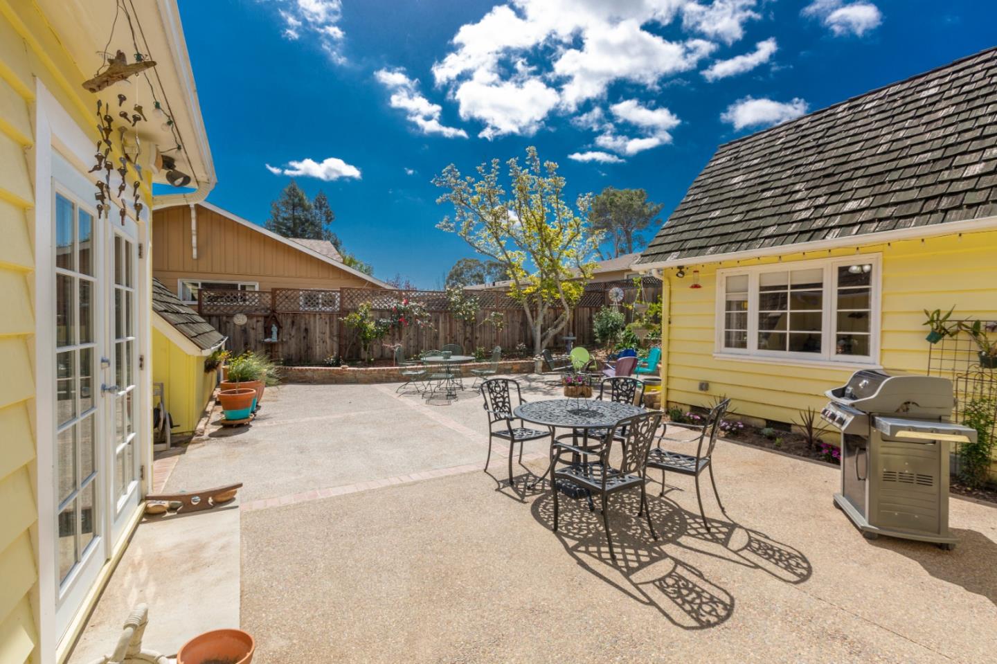 4853 Proctor Road Castro Valley, CA 94546 - Photo 18 of 43 a view of a patio with table and chairs and potted plants