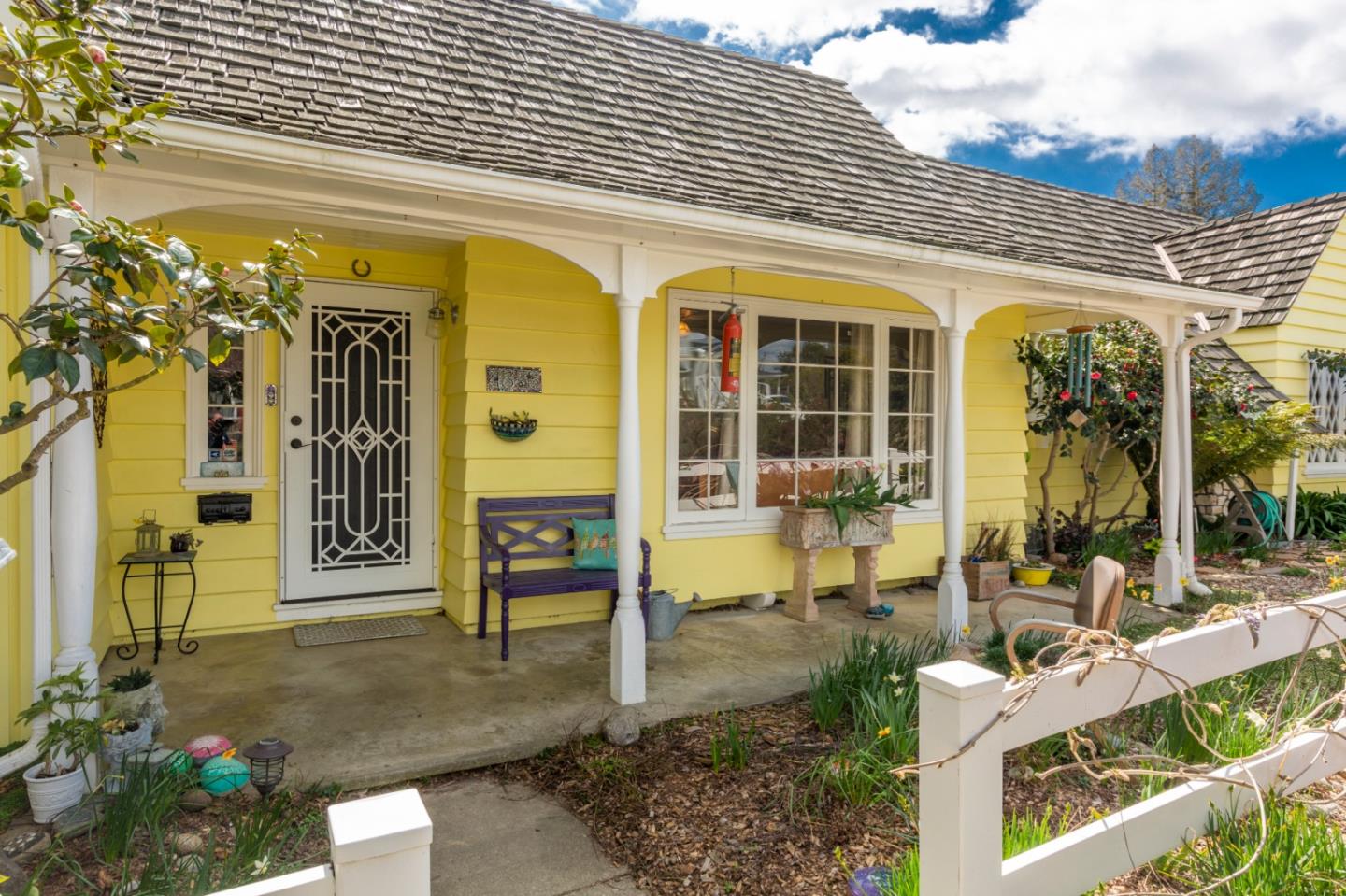 4853 Proctor Road Castro Valley, CA 94546 - Photo 3 of 43 a front view of a building with a garden
