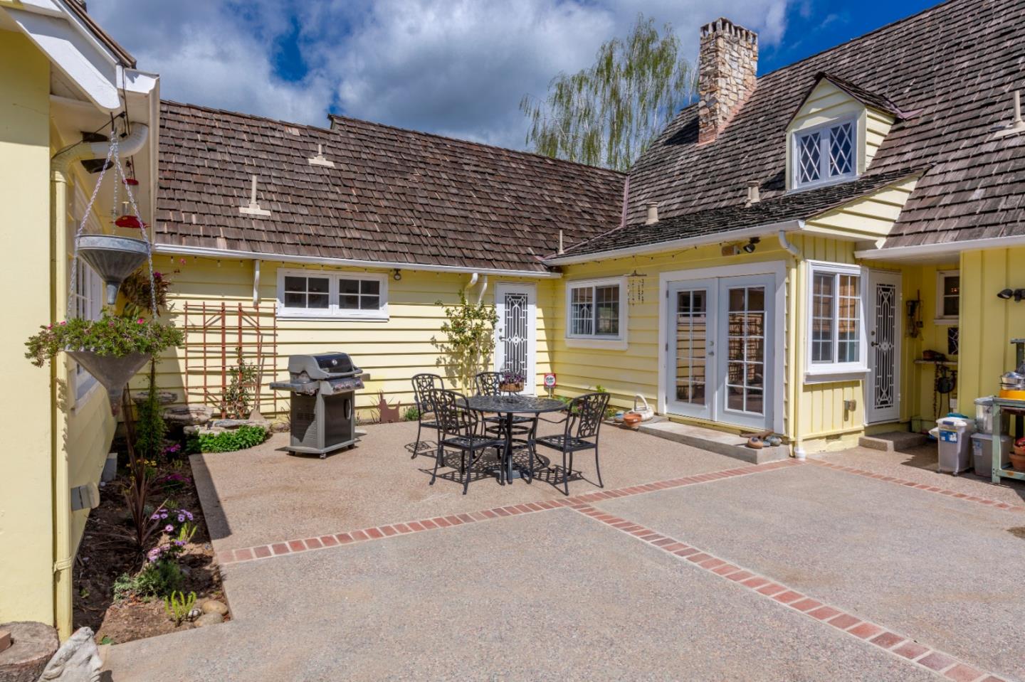 4853 Proctor Road Castro Valley, CA 94546 - Photo 22 of 43 a view of a patio with table and chairs and potted plants