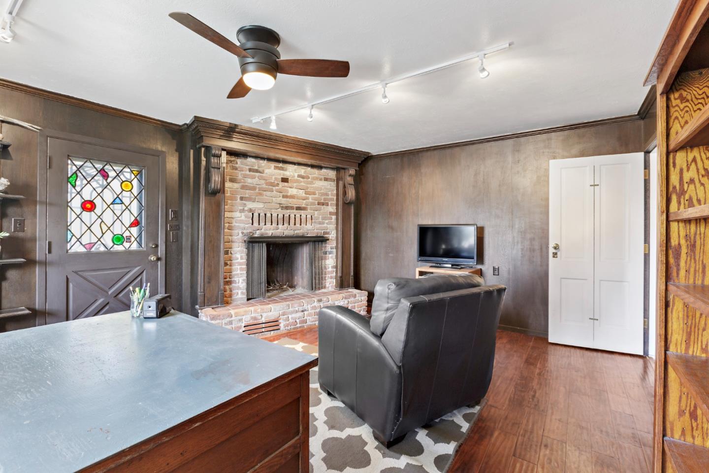4853 Proctor Road Castro Valley, CA 94546 - Photo 25 of 43 a living room with furniture and a flat screen tv