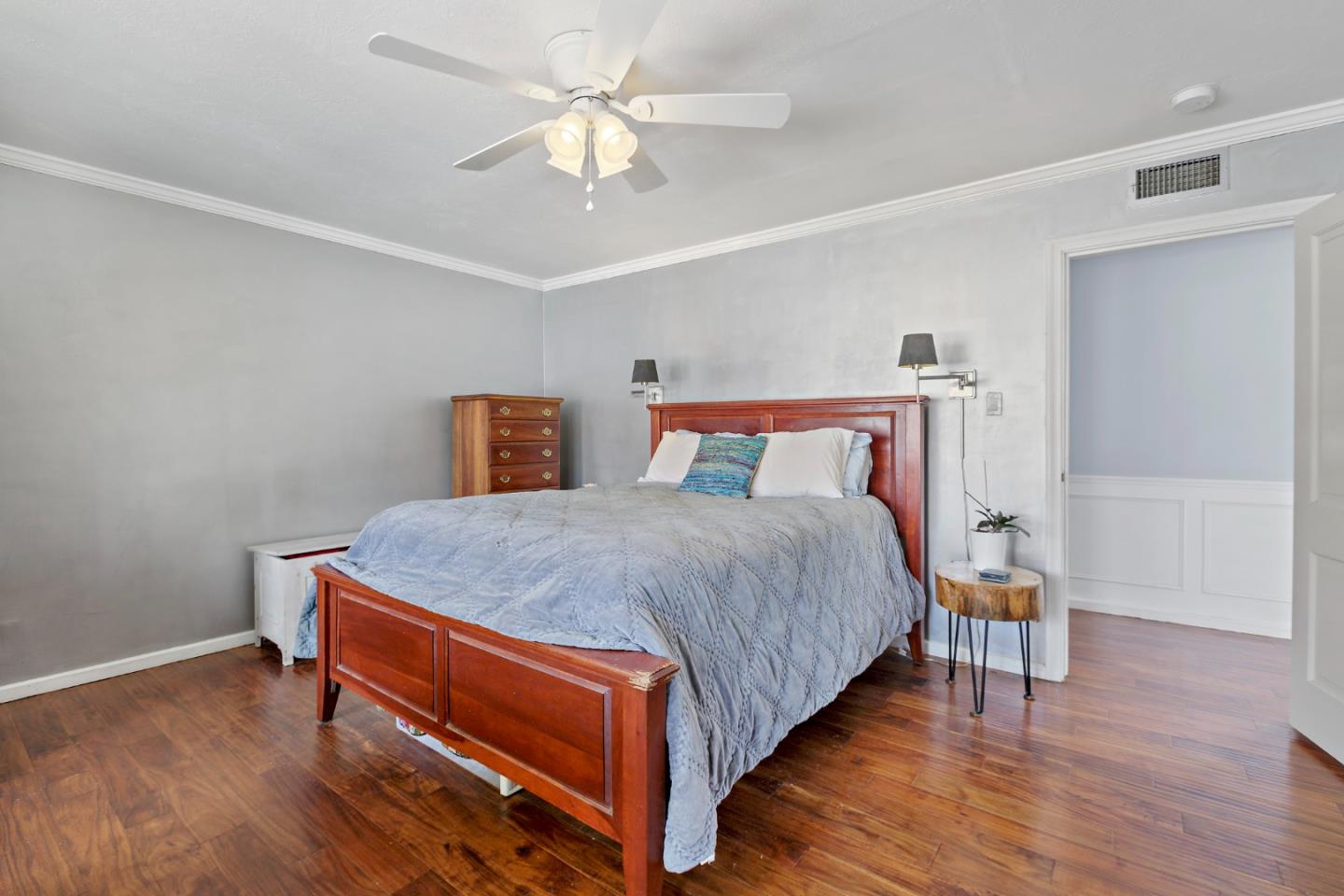 4853 Proctor Road Castro Valley, CA 94546 - Photo 26 of 43 a bedroom with a bed and wooden floor