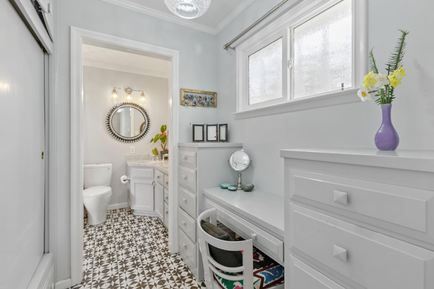 4853 Proctor Road Castro Valley, CA 94546 - Photo 28 of 43 a bathroom with a sink a toilet and a window