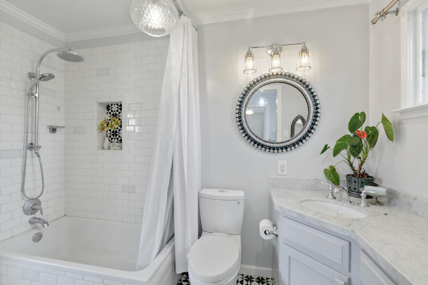 4853 Proctor Road Castro Valley, CA 94546 - Photo 29 of 43 a bathroom with a toilet a sink and mirror
