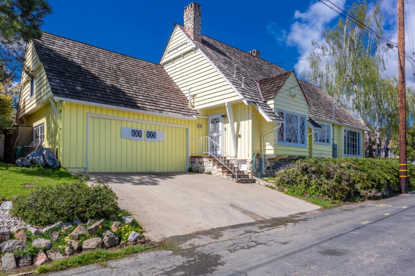 4853 Proctor Road Castro Valley, CA 94546 - Photo 42 of 43 a view of a house with a yard and potted plants