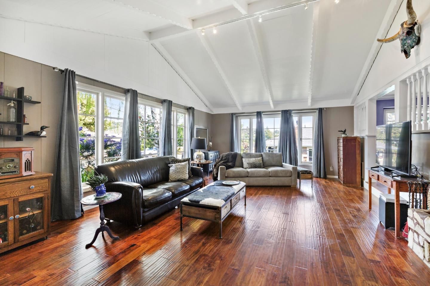 4853 Proctor Road Castro Valley, CA 94546 - Photo 6 of 43 a living room with furniture flat screen tv and a large window